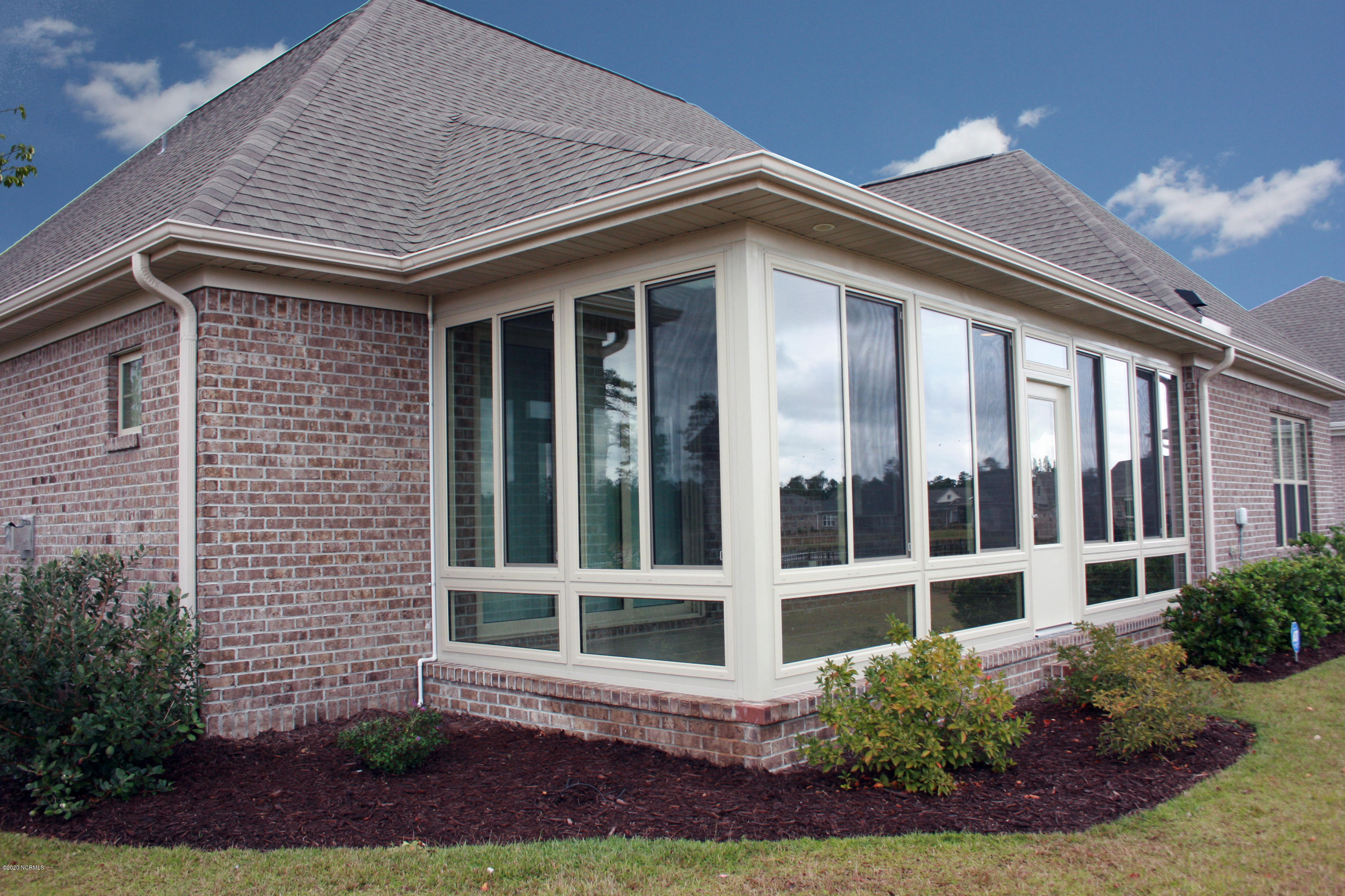2140 Springstone Drive Leland, NC 28451 - Photo 35 of 38 Exterior view of sunroom