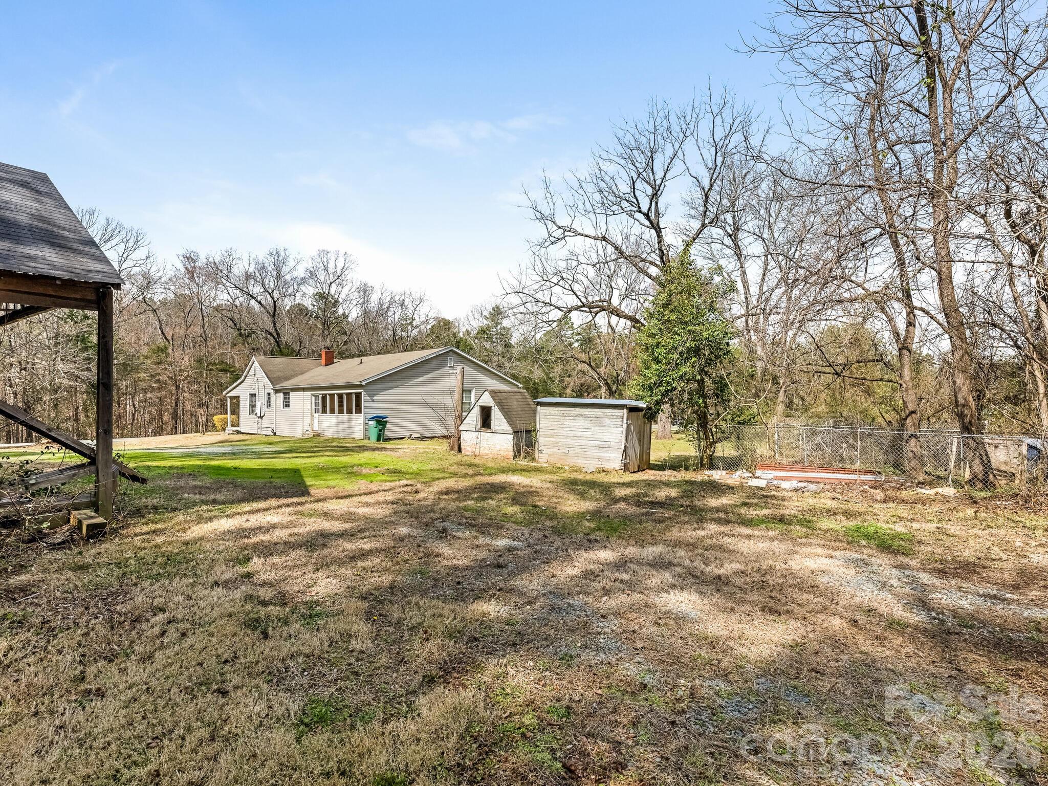 2346 Sam Newell Road Matthews, NC 28105 - Photo 17 of 18 a view of a house with a yard