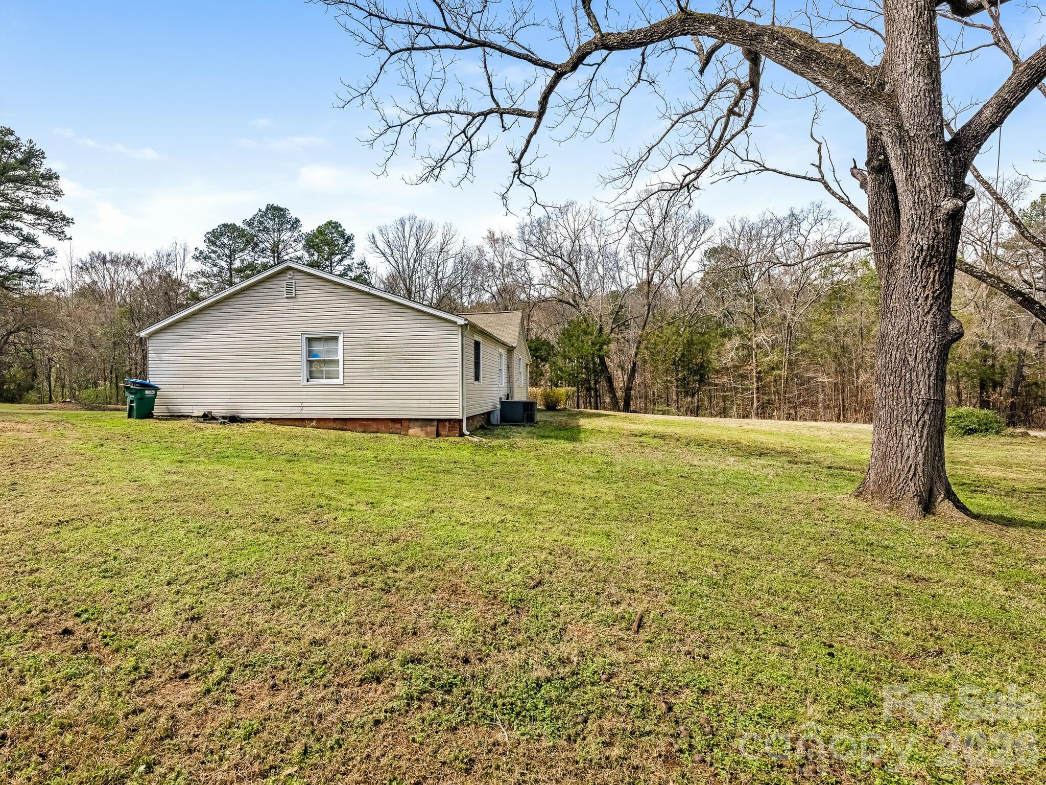 2346 Sam Newell Road Matthews, NC 28105 - Photo 18 of 18 a house view with a garden space