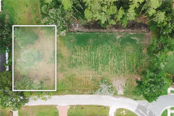 a bathroom with a shower and a yard