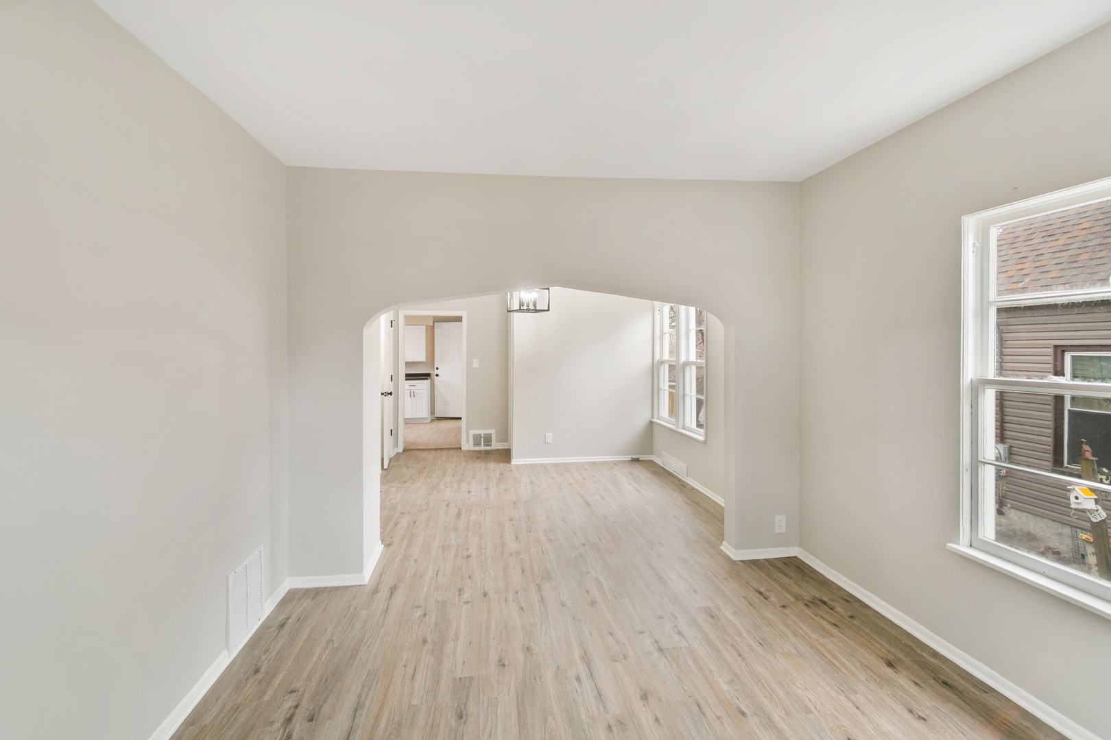 8 Ivy Street Joliet, IL 60436 - Photo 3 of 13 a view of a livingroom with wooden floor