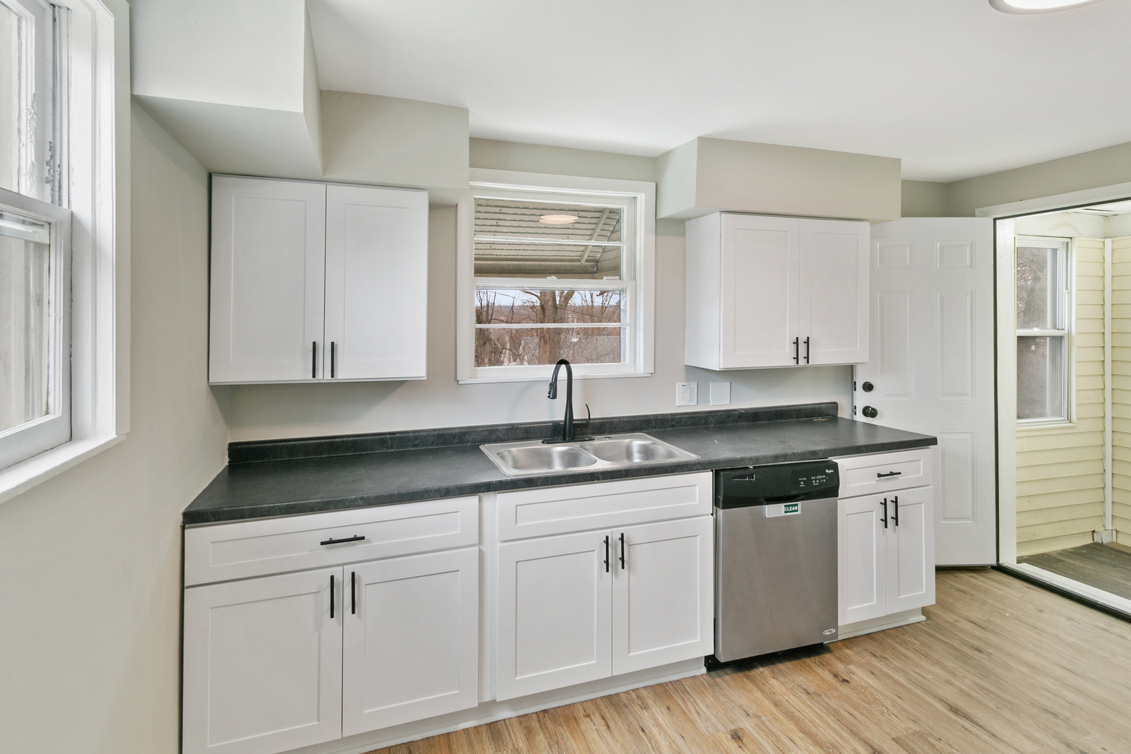 8 Ivy Street Joliet, IL 60436 - Photo 8 of 13 a kitchen with granite countertop white cabinets and a sink