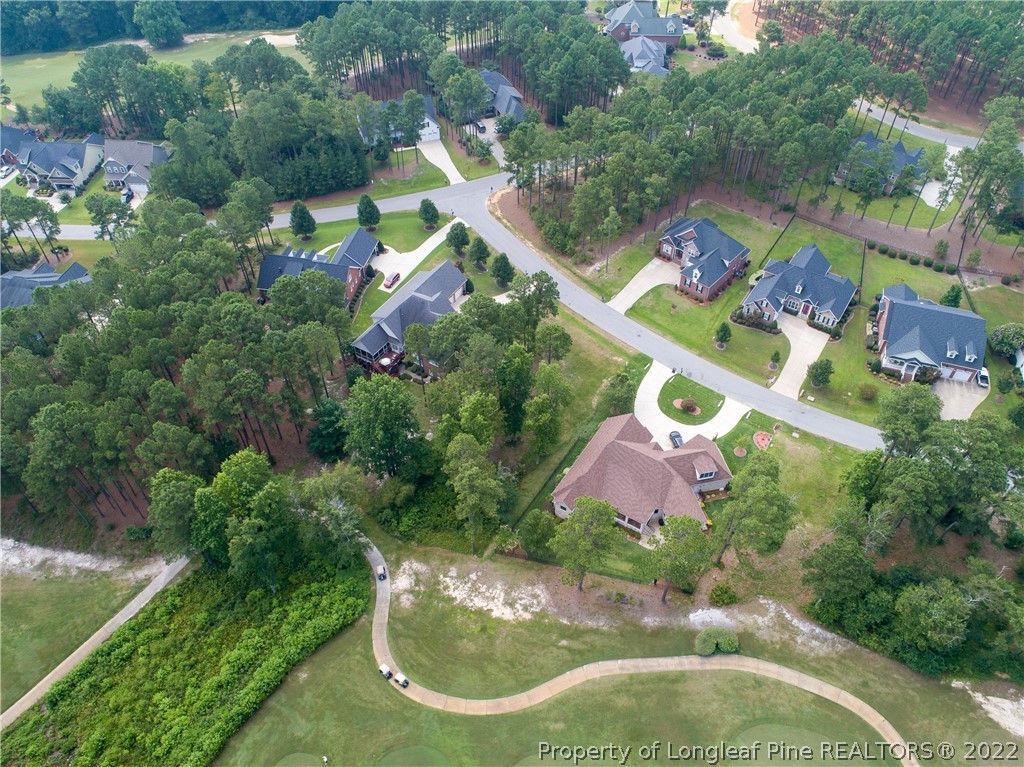 335 Barons (449) Run Spring Lake West Spring Lake, NC 28390 - Photo 20 of 22 an aerial view of a house with a garden and swimming pool
