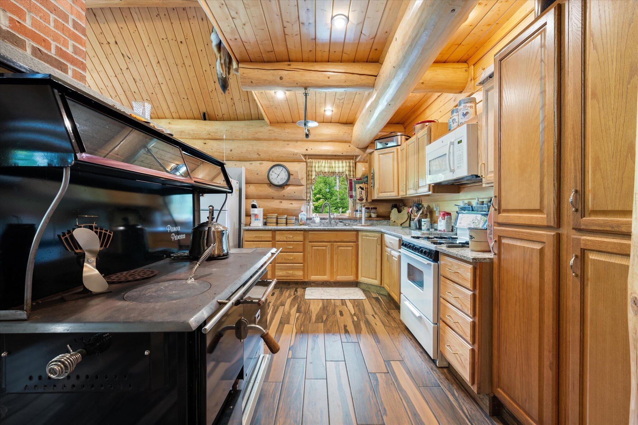 314 Atwood Pond Road Patten, ME 04765 - Photo 18 of 76 Tiled Wood Accent Flooring thruought...