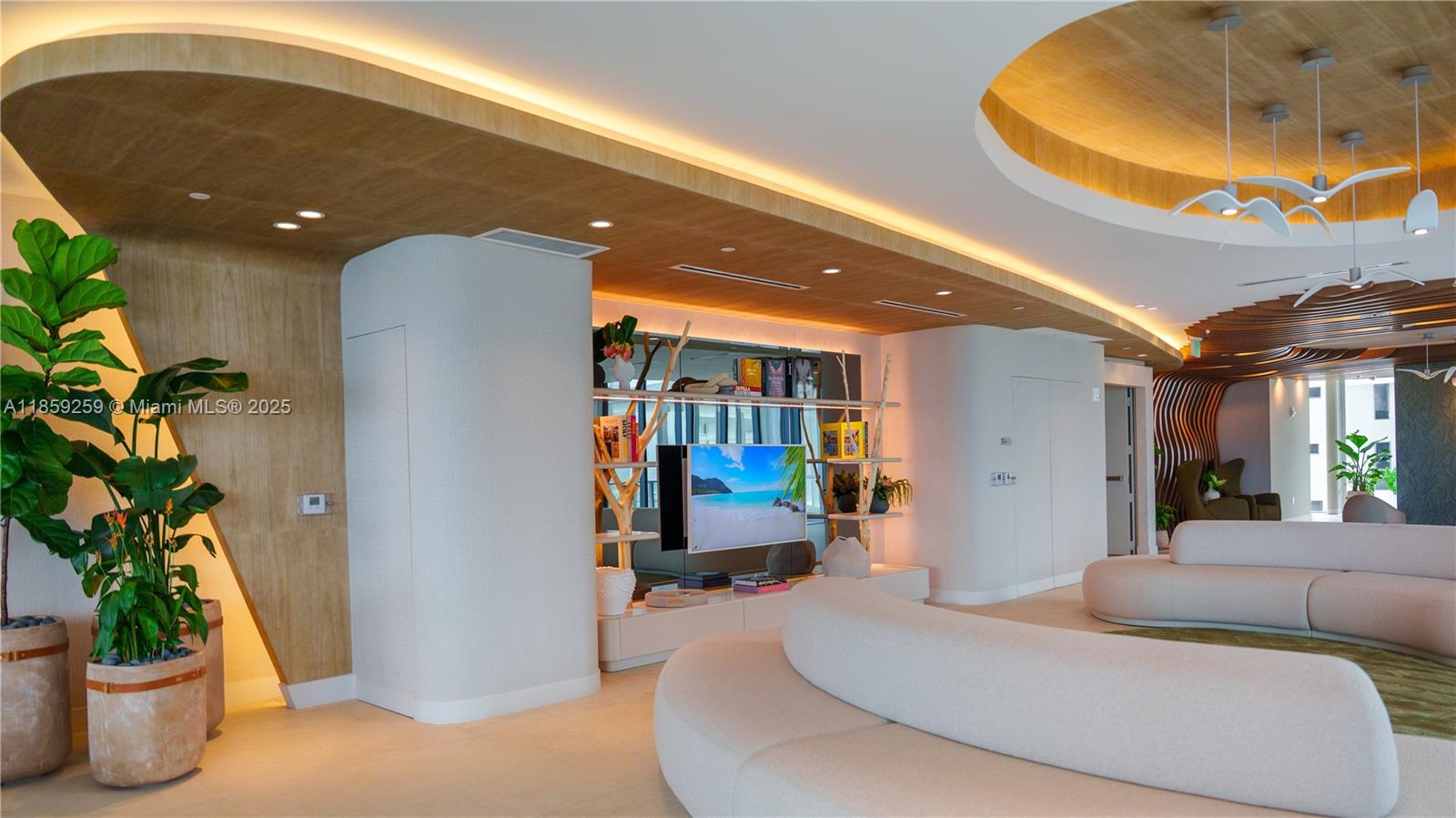 700 Northeast 24th Street, Unit 4407 Miami, FL 33137 - Photo 13 of 75 a living room with furniture and a potted plant