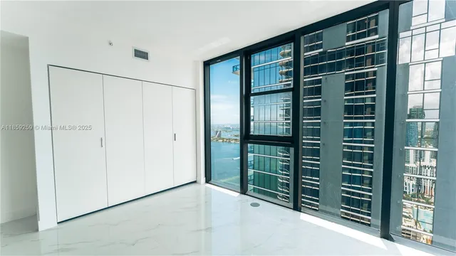 a bathroom with a tub and a shower