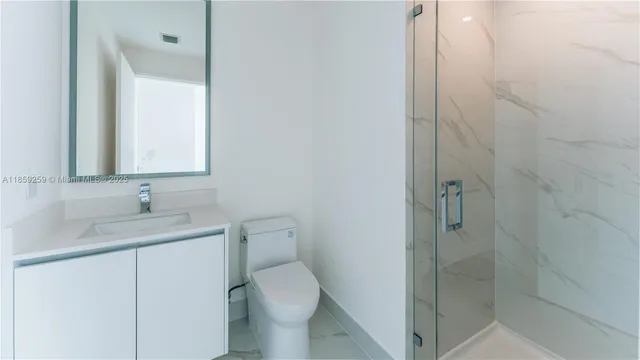 a bathroom with a tub and sink