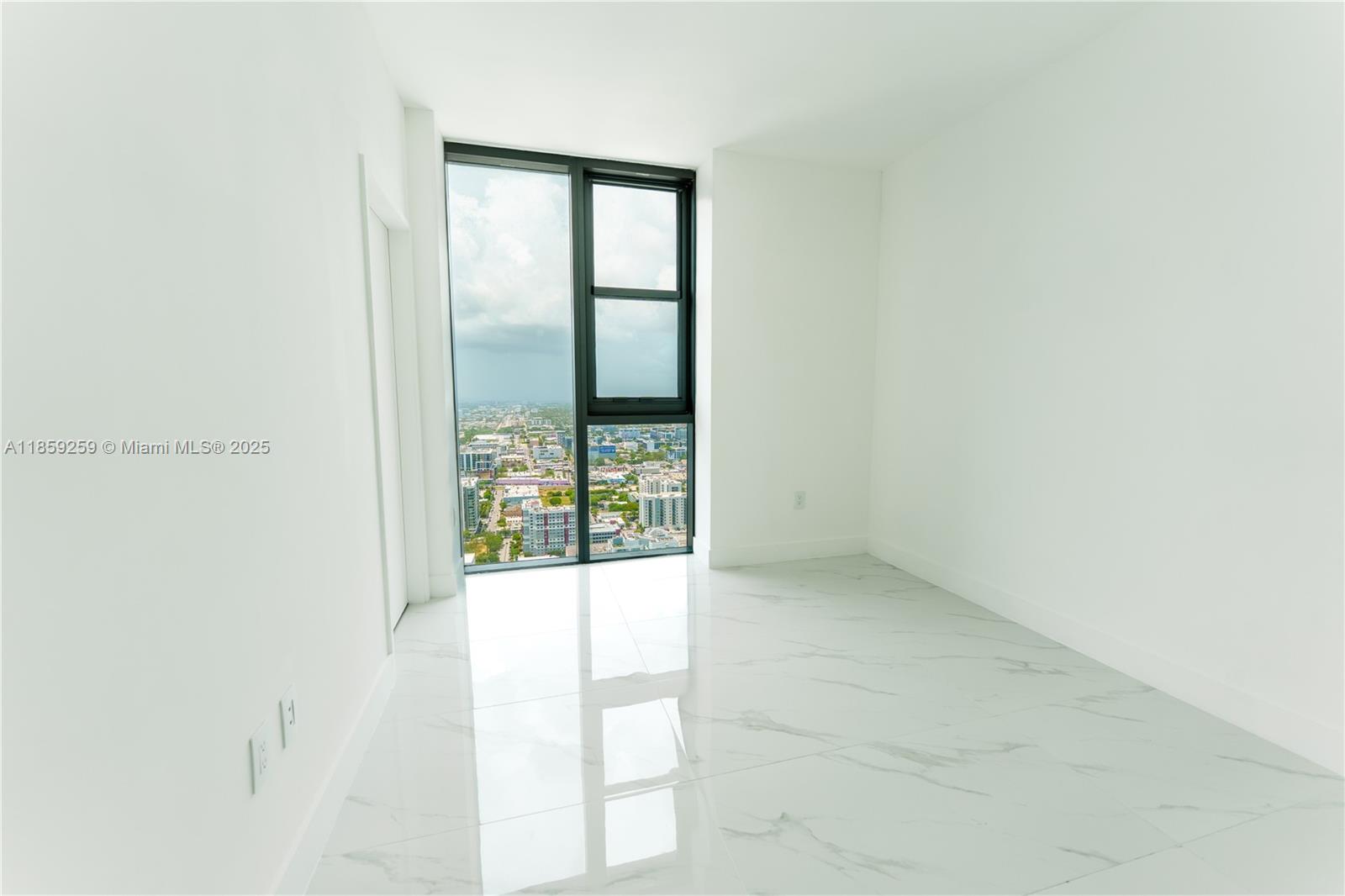 700 Northeast 24th Street, Unit 4407 Miami, FL 33137 - Photo 46 of 75 an empty room with windows