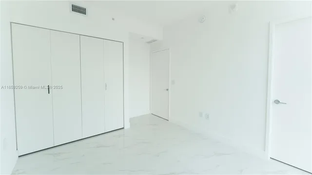 a view of an empty room with window