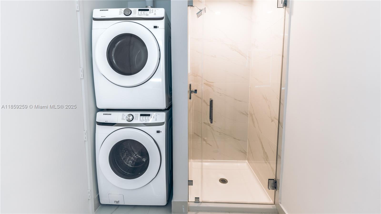 700 Northeast 24th Street, Unit 4407 Miami, FL 33137 - Photo 70 of 75 a utility room with dryer and washer