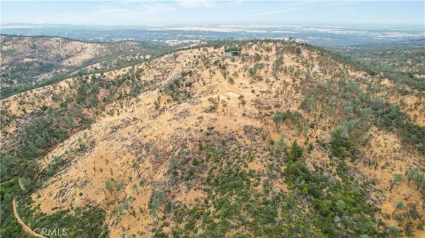 a view of a mountain from a yard