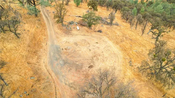 a bathroom with a white wall