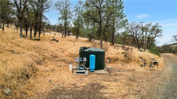 a view of a yard covered in snow