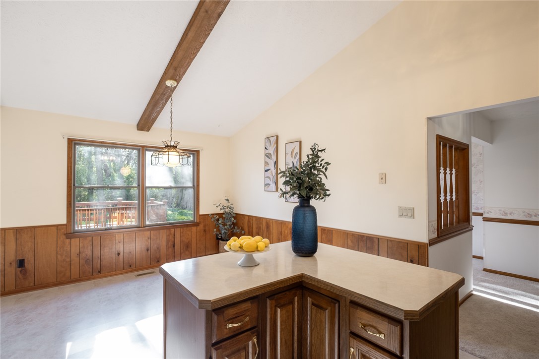 276 South Fairfield Road Bellbrook, OH 45305 - Photo 11 of 38 This spacious kitchen offers ample counter space and overlooks a serene outdoor area.
