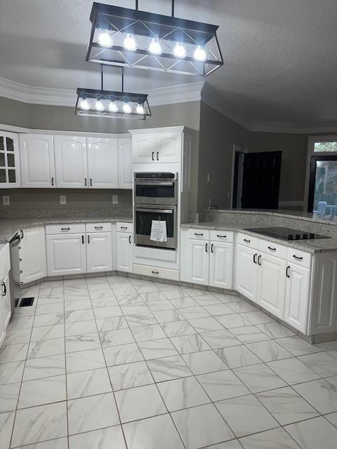 370 Buchanan Circle Dallas, GA 30157 - Photo 11 of 54 a kitchen with granite countertop a sink a stove and cabinets