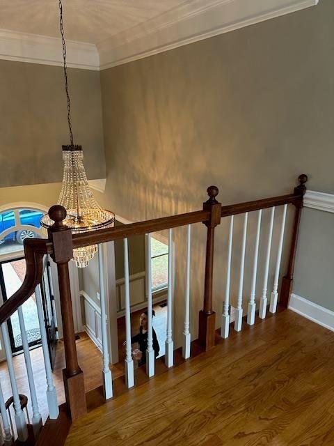 370 Buchanan Circle Dallas, GA 30157 - Photo 17 of 54 a view of a hallway with wooden floor and staircase