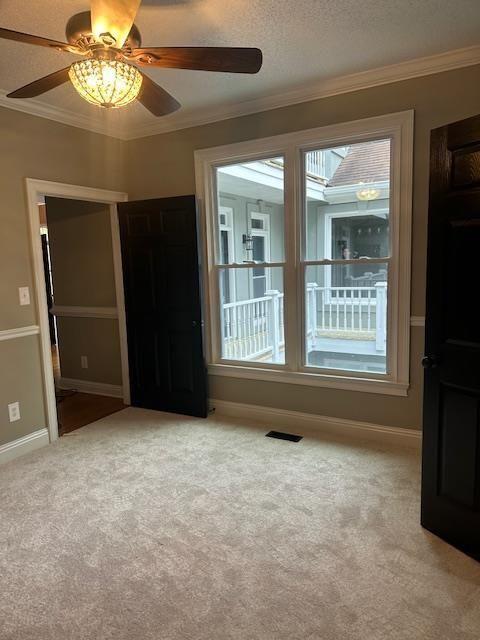 370 Buchanan Circle Dallas, GA 30157 - Photo 19 of 54 en empty room with windows and ceiling fan