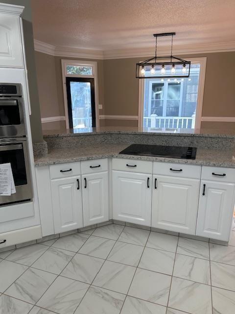 370 Buchanan Circle Dallas, GA 30157 - Photo 20 of 54 a kitchen with white cabinets appliances and a sink