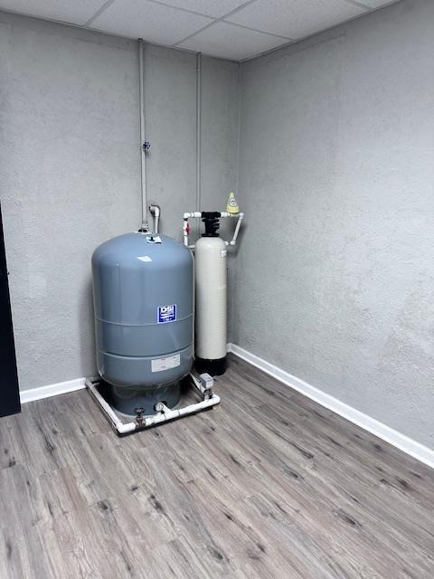 370 Buchanan Circle Dallas, GA 30157 - Photo 49 of 54 a room with wooden floor and white walls