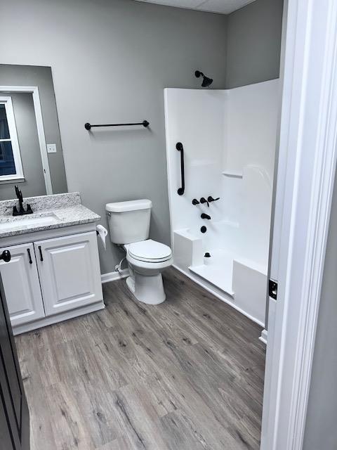 370 Buchanan Circle Dallas, GA 30157 - Photo 53 of 54 a white toilet sitting next to a bathroom sink