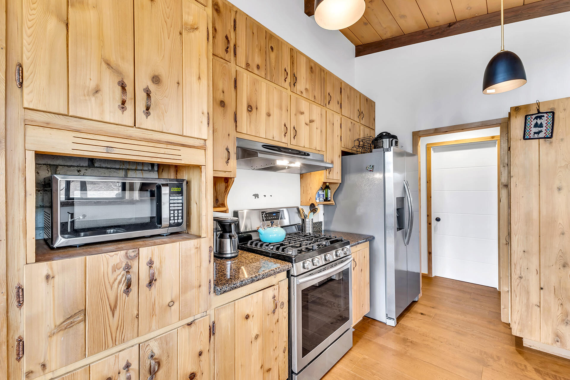 27011 Lookout Lane Idyllwild, CA 92549 - Photo 26 of 68 a kitchen with stainless steel appliances granite countertop a stove and a refrigerator