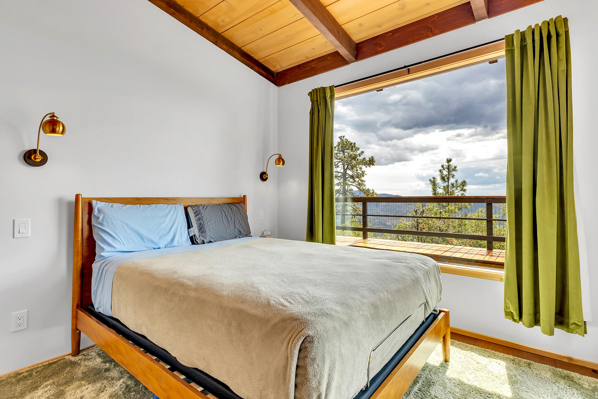 27011 Lookout Lane Idyllwild, CA 92549 - Photo 38 of 68 a bedroom with a bed and a large window with outer view