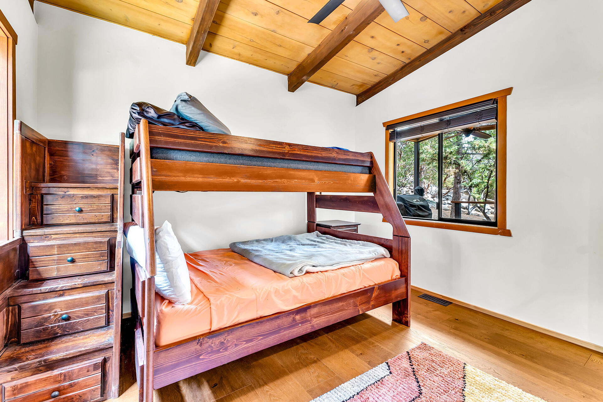 27011 Lookout Lane Idyllwild, CA 92549 - Photo 50 of 68 a bedroom with a bed and wooden floor