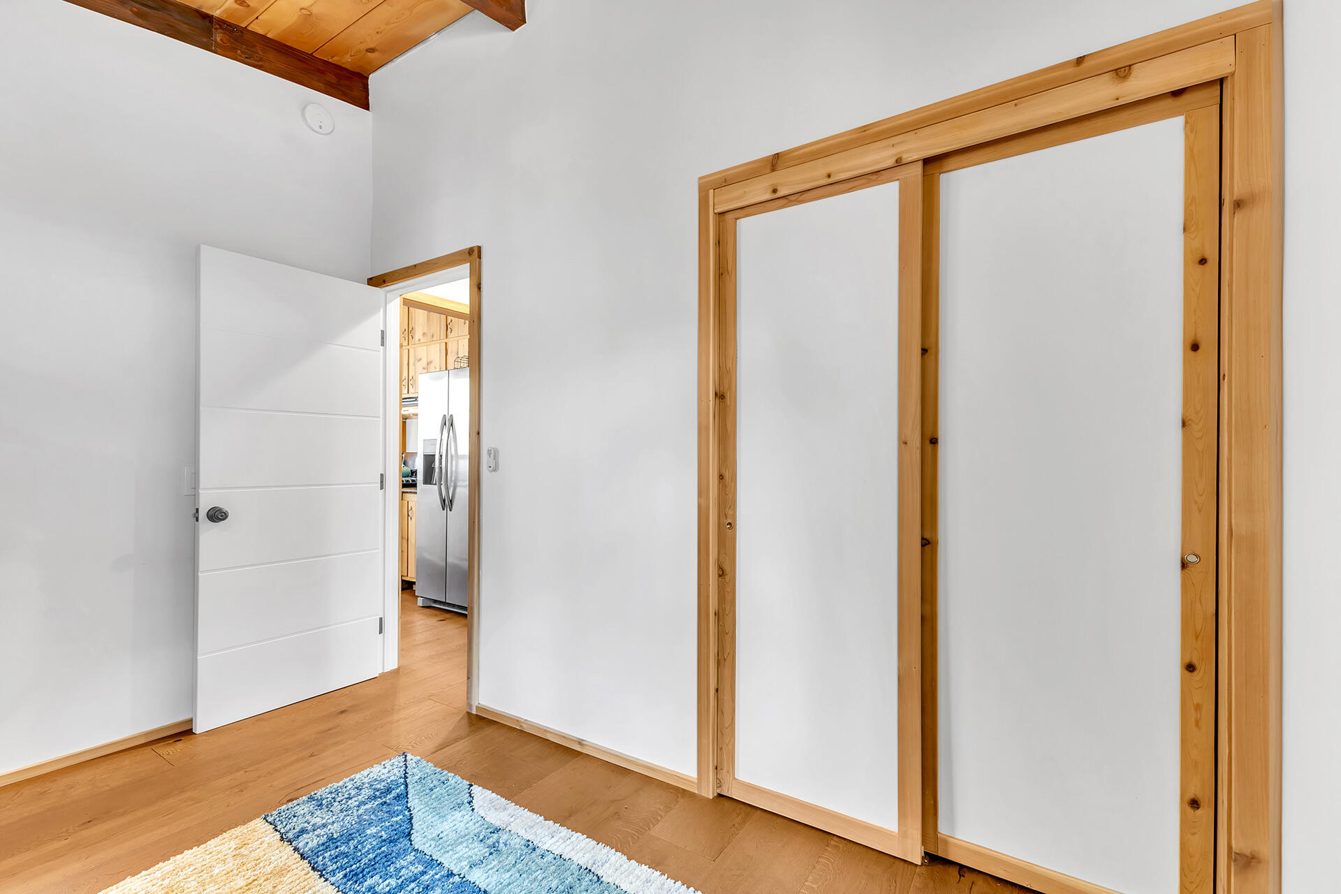 27011 Lookout Lane Idyllwild, CA 92549 - Photo 51 of 68 a view of a bedroom with wooden floor and closet