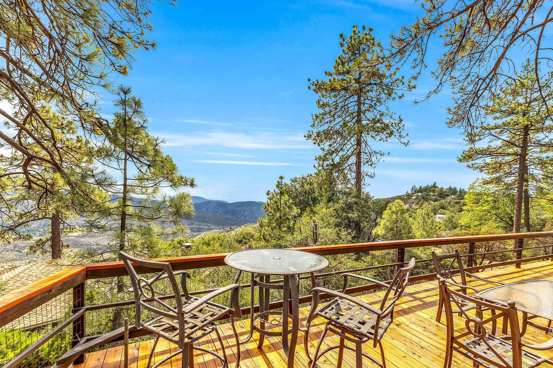 27011 Lookout Lane Idyllwild, CA 92549 - Photo 56 of 68 a view of a chairs and table in the patio
