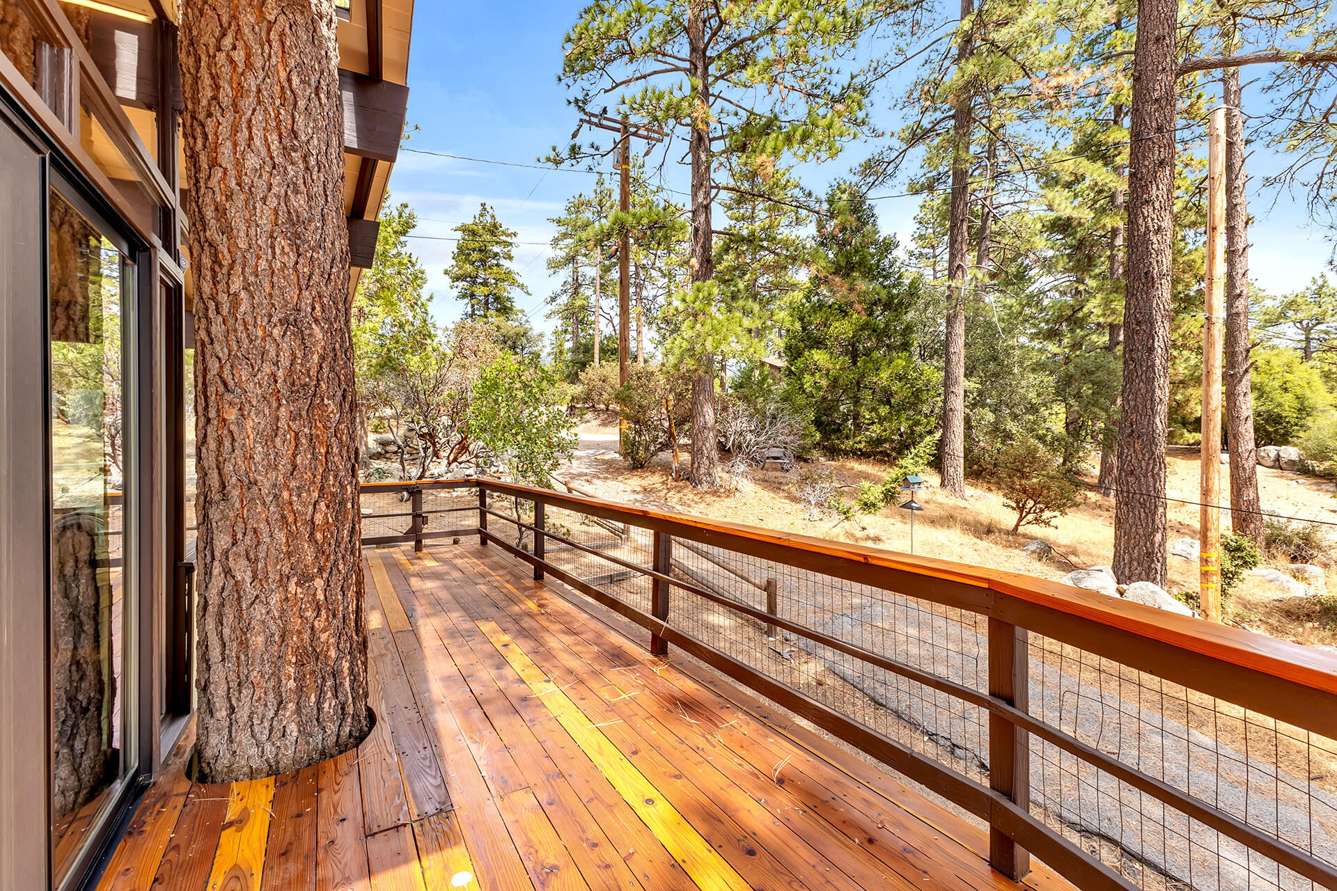 27011 Lookout Lane Idyllwild, CA 92549 - Photo 62 of 68 a view of balcony with wooden floor and fence