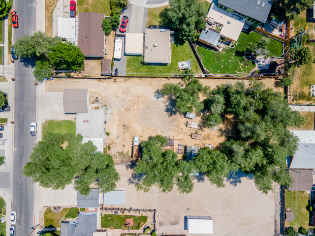 120 Cox Lane Midvale, UT 84047 - Photo 7 of 13 Expansive undeveloped lot featuring mature trees and clear ground