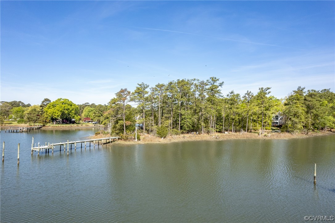 600 Ship Point Road Yorktown, VA 23692 - Photo 3 of 42 a view of a lake with houses in the back