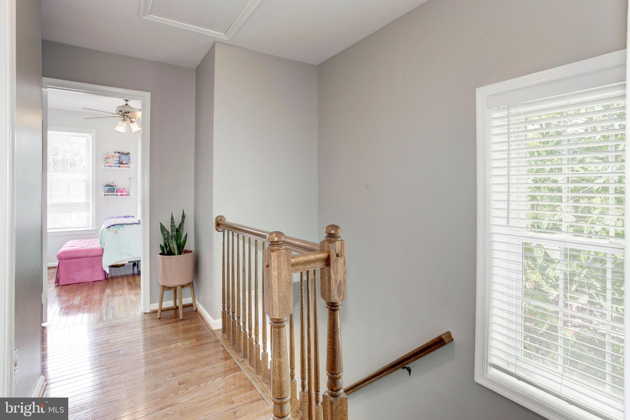 7728 Hickory Glen Way Springfield, VA 22153 - Photo 13 of 26 a view of a hallway with furniture and front door