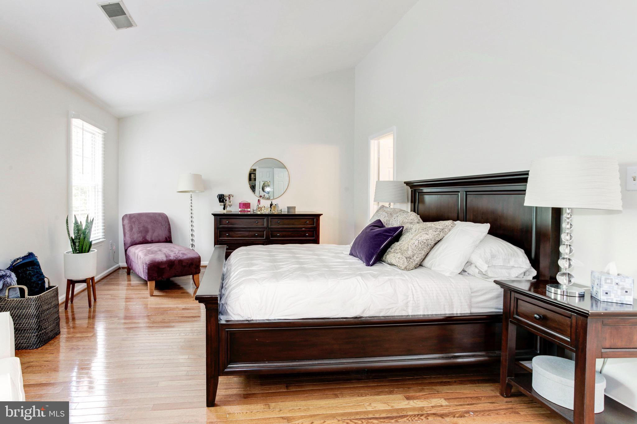 7728 Hickory Glen Way Springfield, VA 22153 - Photo 14 of 26 a bedroom with bed and window