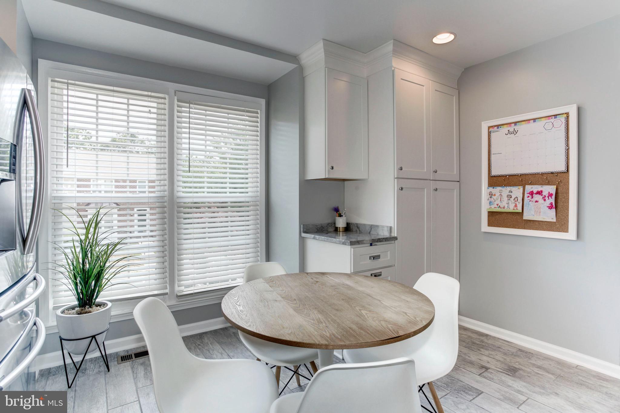 7728 Hickory Glen Way Springfield, VA 22153 - Photo 5 of 26 a room with furniture and window