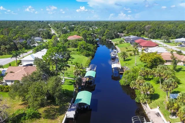 a view of a lake with a yard