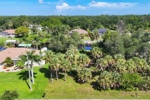 a view of a lake with a city