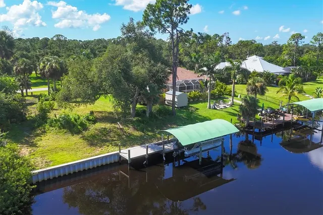 a view of a lake with a house