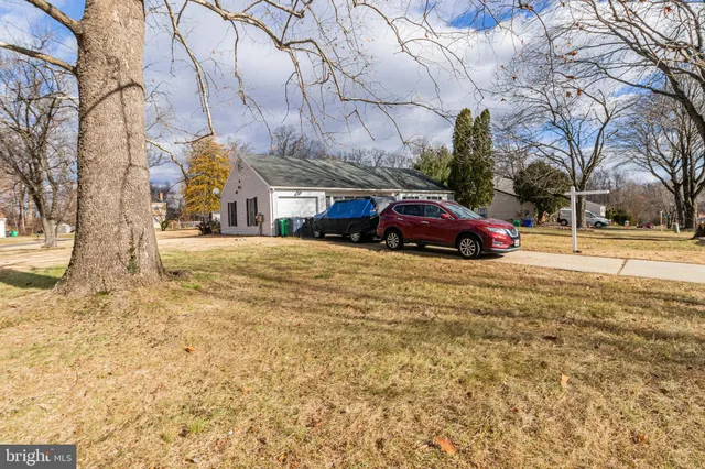 a view of street with parked cars