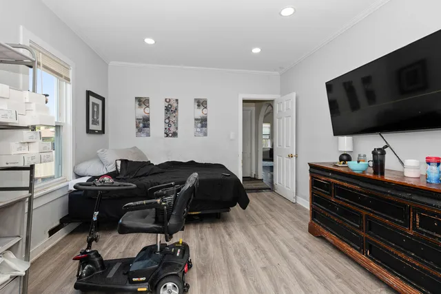 a bedroom with a bed and furniture