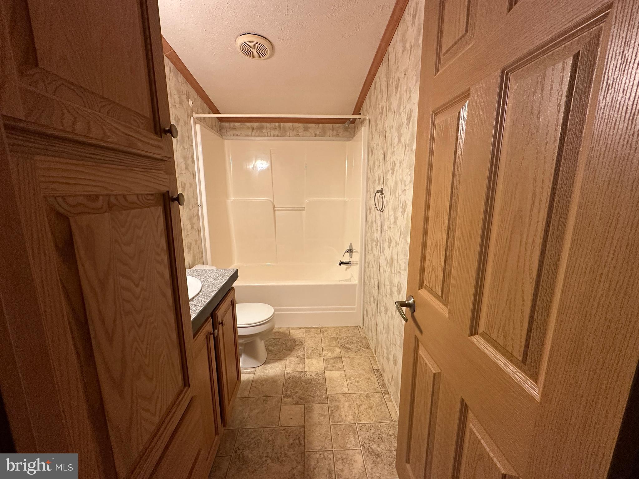 4391 Cito Road McConnellsburg, PA 17233 - Photo 61 of 67 a bathroom with a shower and a toilet