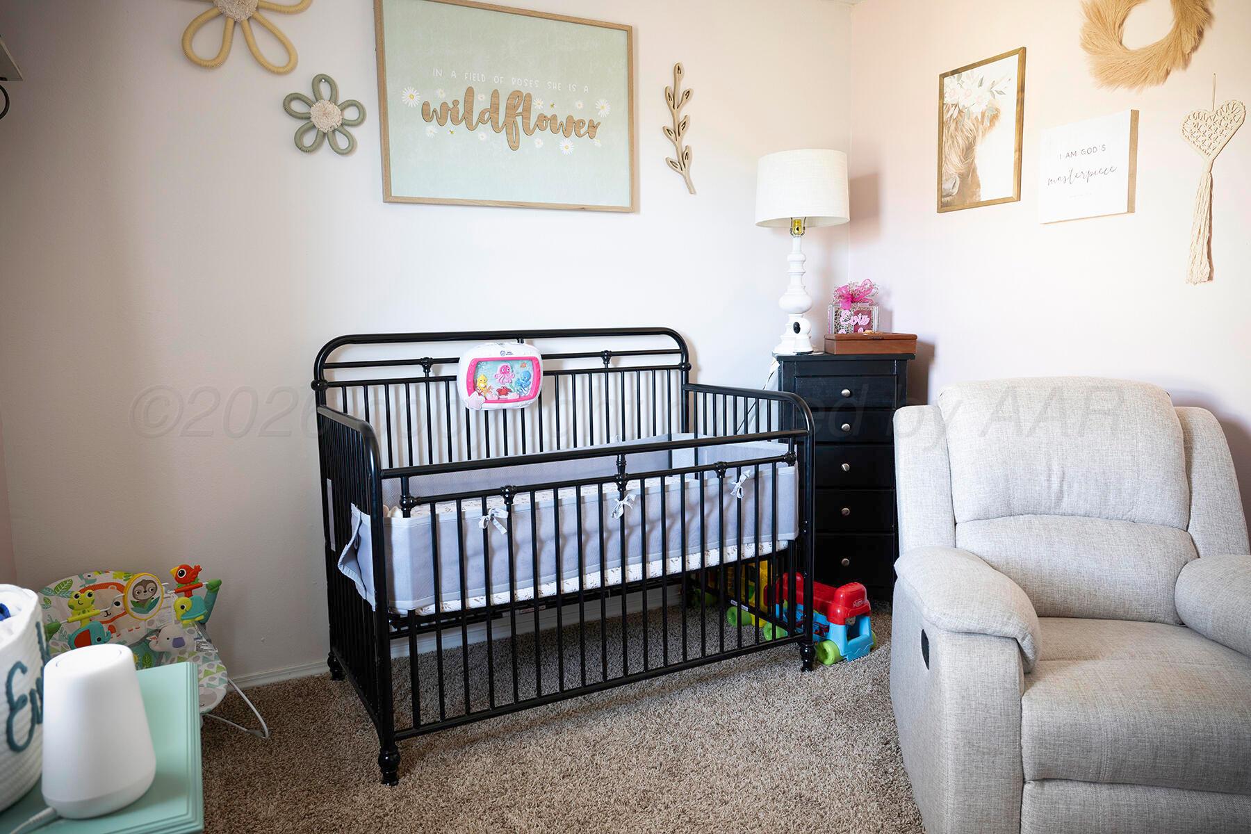 611 Floyd Avenue Dumas, TX 79029 - Photo 17 of 28 a living room with furniture