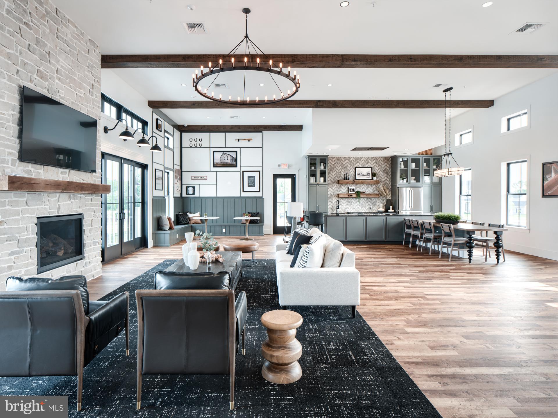 500 Slugger Alley, Unit MILTON Frederick, MD 21702 - Photo 27 of 53 a living room with furniture fireplace and flat screen tv