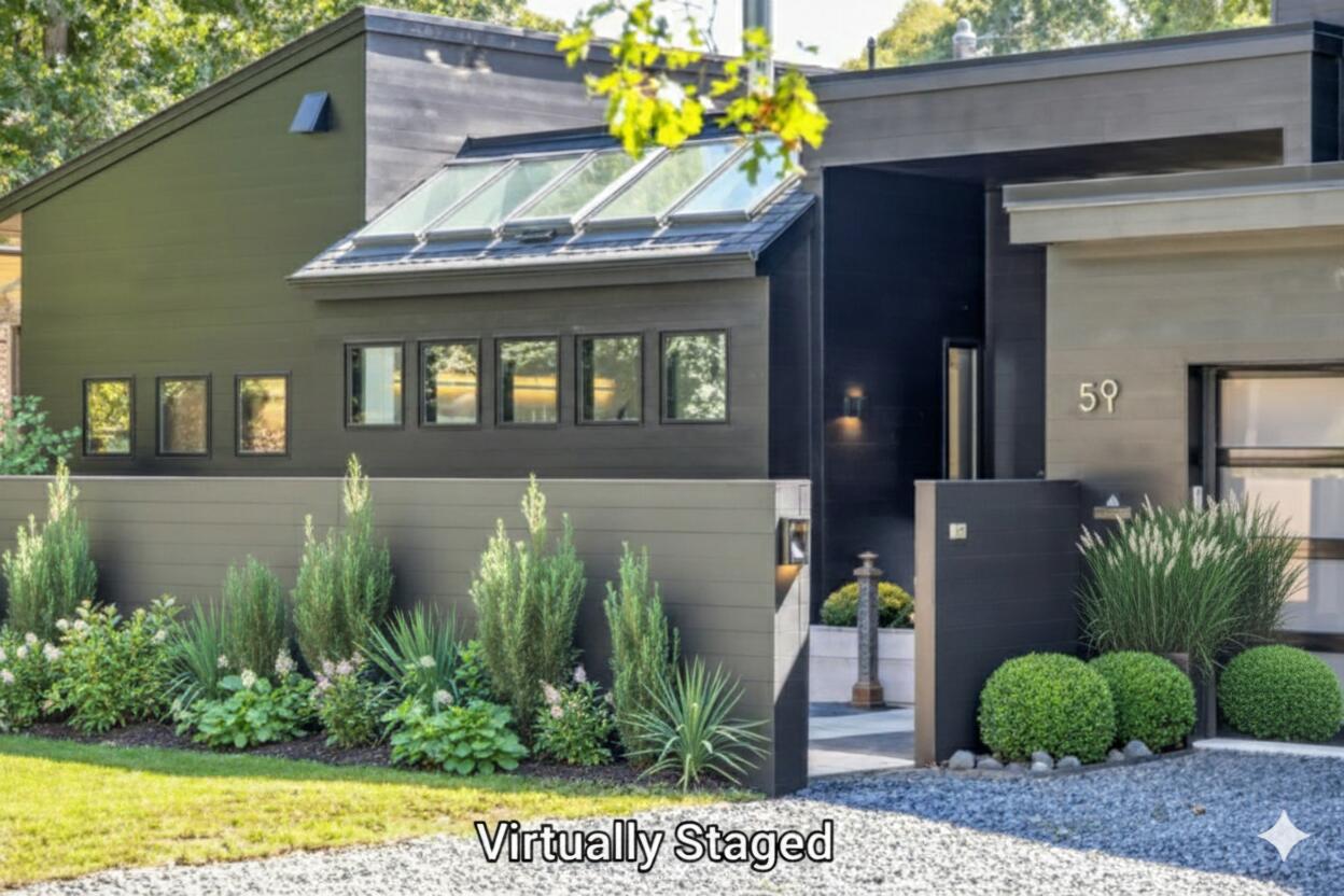 a front view of a house with a garden