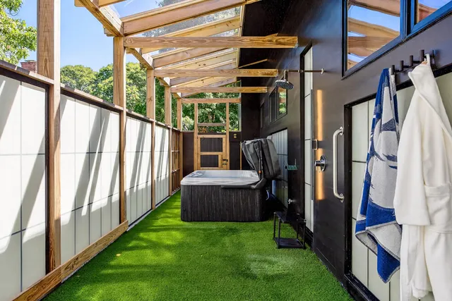 a view of house with outdoor seating