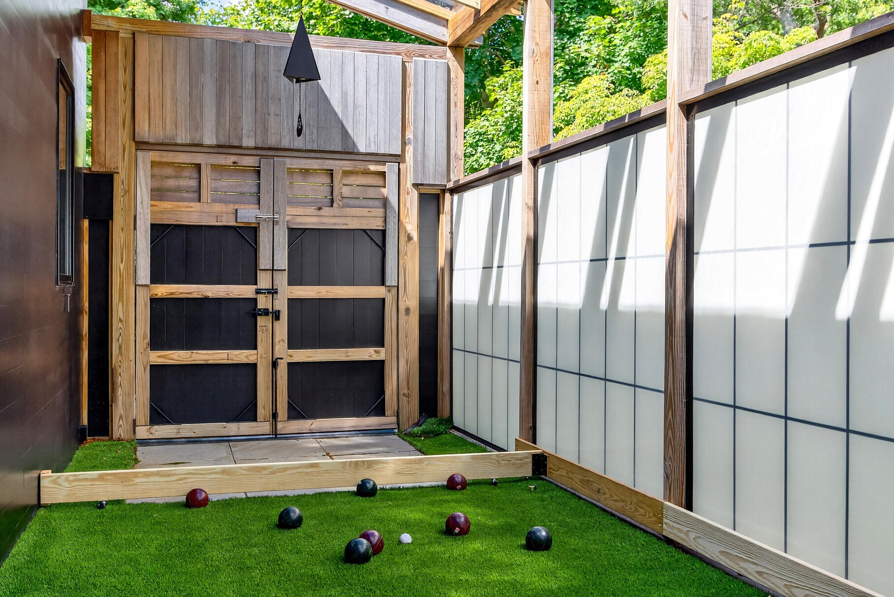 50 Rivers Edge Road East Falmouth, MA 02536 - Photo 23 of 55 a view of backyard with wooden fence and large windows