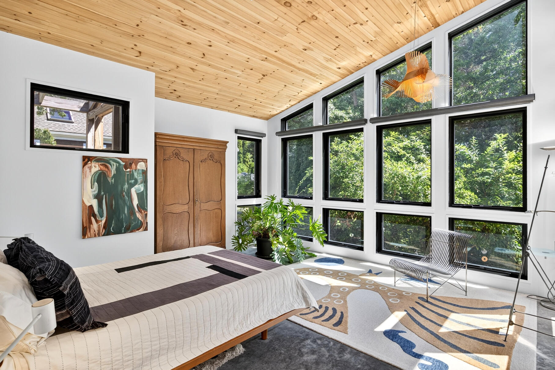 50 Rivers Edge Road East Falmouth, MA 02536 - Photo 3 of 55 a bedroom with a bed and a large window with the outer view