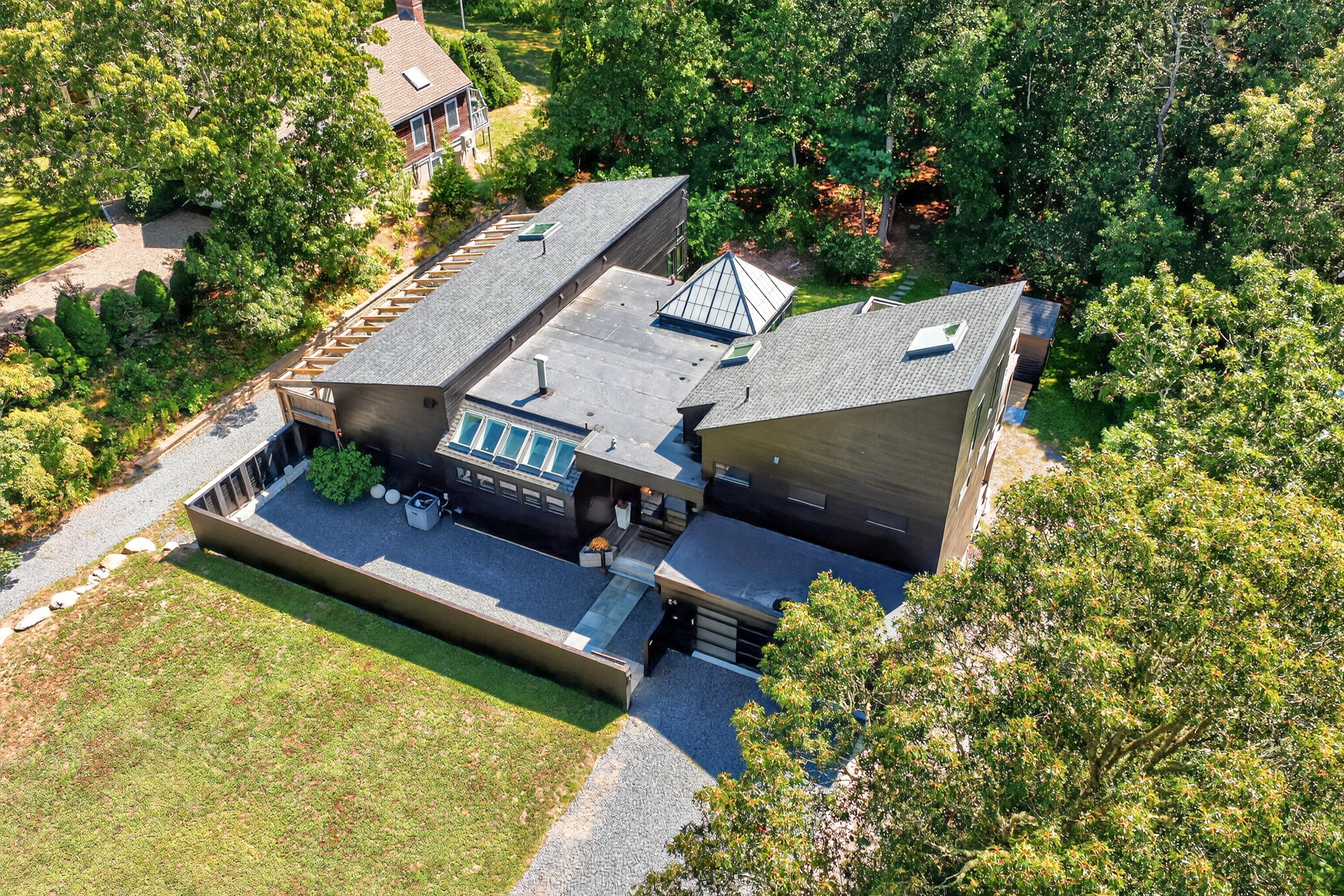 50 Rivers Edge Road East Falmouth, MA 02536 - Photo 48 of 55 an aerial view of a house with swimming pool and a yard