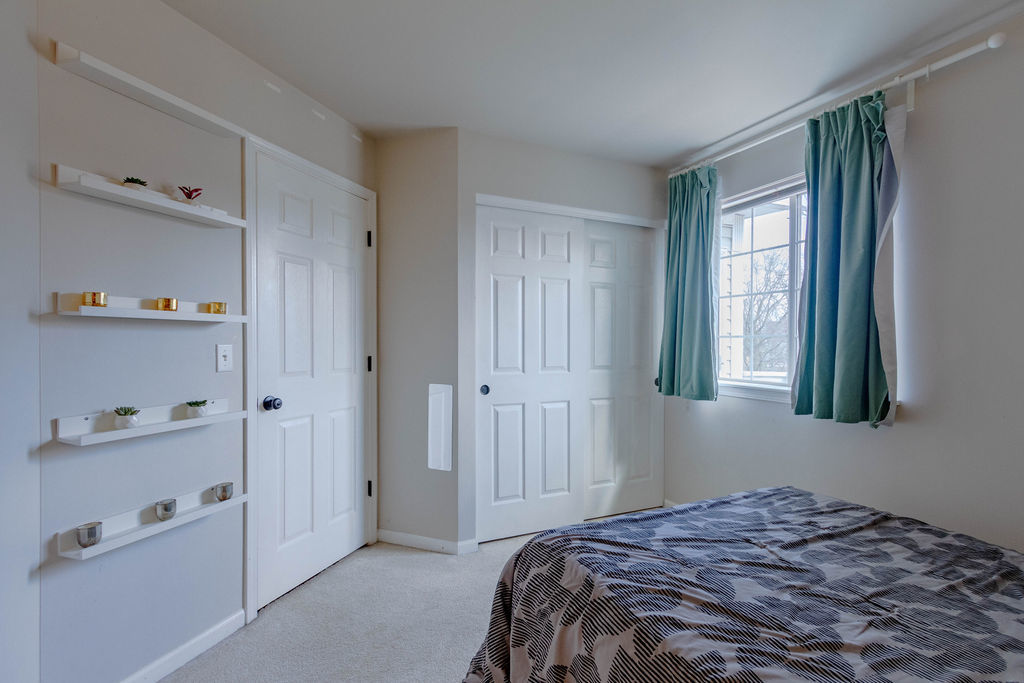 338 Springmist Court Bolingbrook, IL 60440 - Photo 20 of 29 a bedroom with a bed and a window