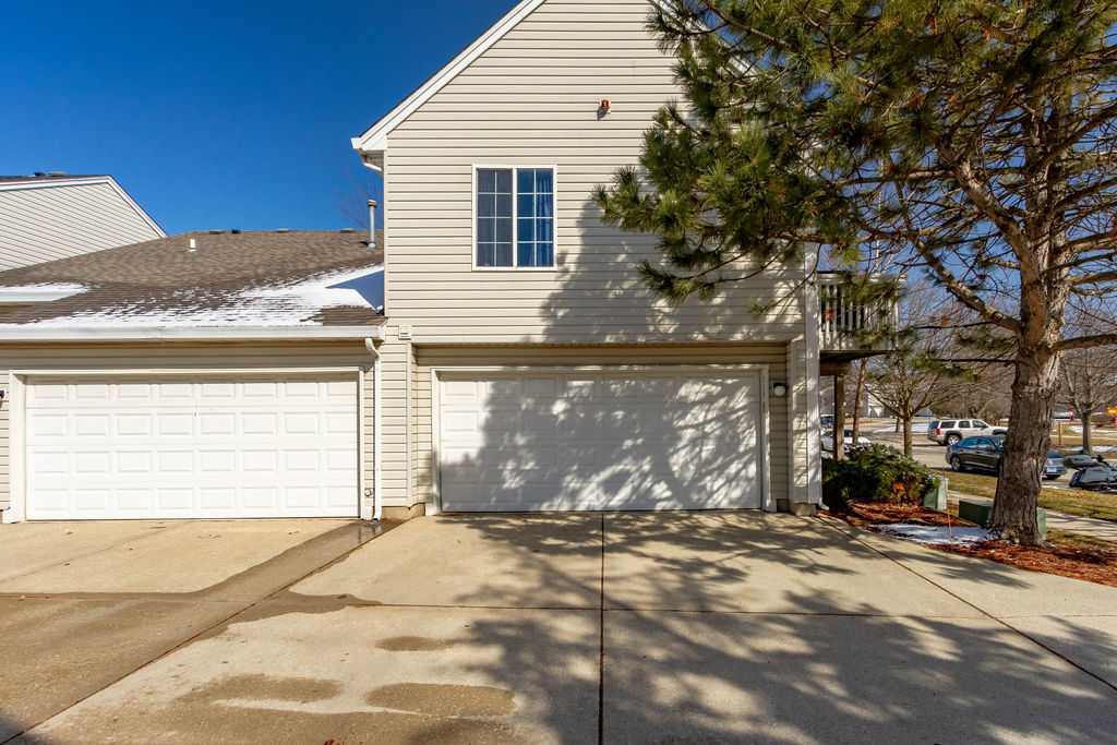 338 Springmist Court Bolingbrook, IL 60440 - Photo 4 of 29 a front view of a house with a yard